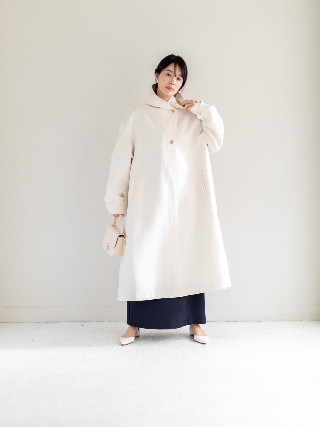 Irene / switch neck feather long coat (perl/midnight/noir)