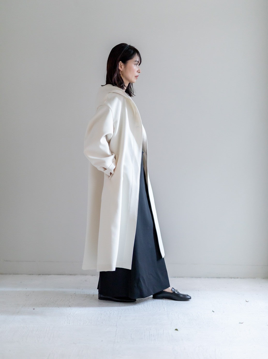 Irene / switch neck feather long coat (perl/midnight/noir)