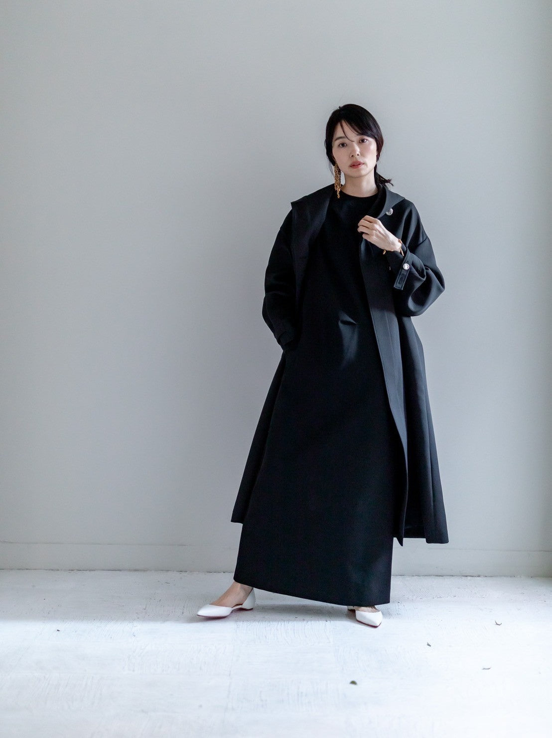 deres デレスswitch neck feather long coat - レディース